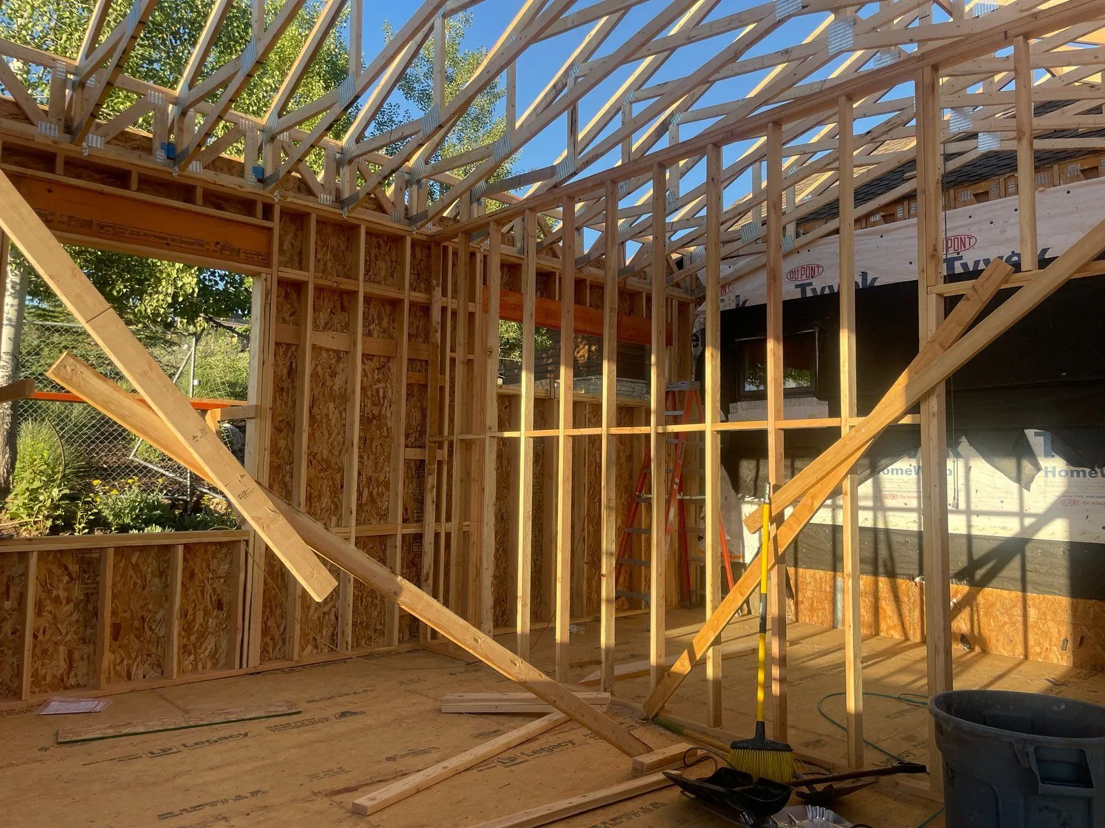An addition during framing: new studs, rafters and sheathing
